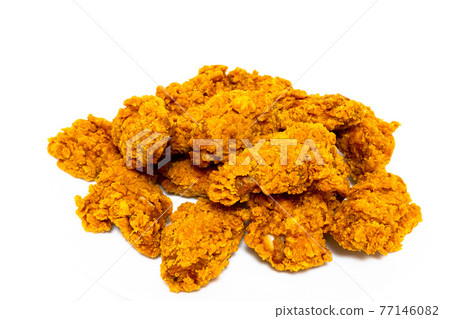 Deep fried spicy chicken wings in a crispy breading, chicken fast food isolated on white background 77146082