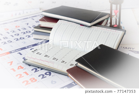 Calendar, notebook, hourglass, calendar year, scheduled time 77147353