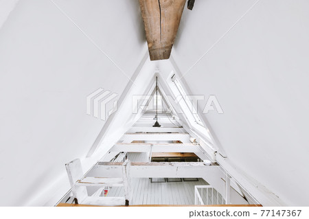 Roof beams in mansard apartment Roof beams in mansard apartment 77147367