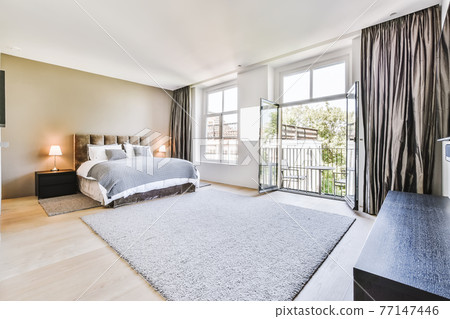 Spacious bedroom in modern flat 77147446