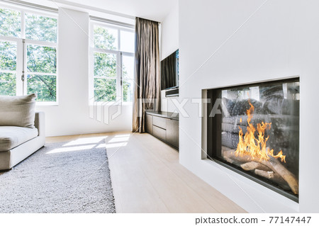 Cozy living room with fireplace Cozy living room with fireplace 77147447