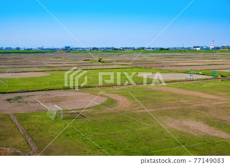 Nishiasuma farmland Arakawa riverbed Early spring scenery Nishiasuma farmland Arakawa riverbed Early spring scenery 77149083