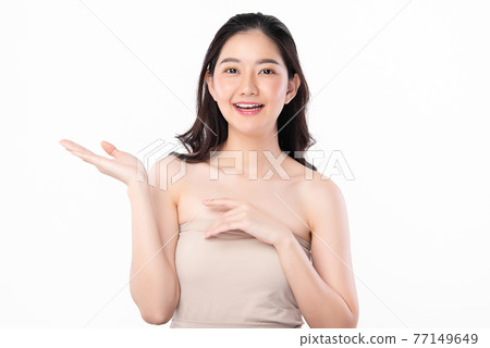 Beautiful young asian woman with clean fresh skin on white background, Face care, Facial treatment, 77149649