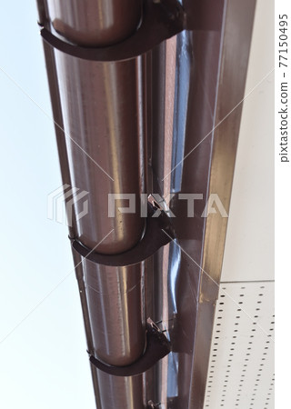 Snow gutter broken by heavy snow 77150495