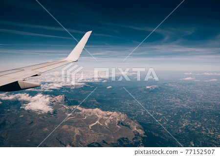 Apennine mountains in Italy - view from the plane window Apennine mountains in Italy - view from the plane window 77152507