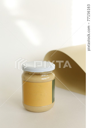 peanut butter in closed jar 77156163