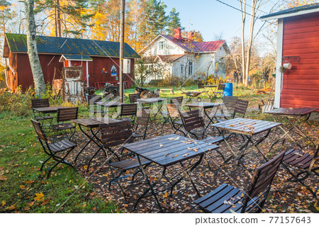 KOUVOLA, FINLAND - OCTOBER 15, 2018: Beautiful autumn in old rustic museum district of Kouvola - Kaunisnurmi KOUVOLA, FINLAND - OCTOBER 15, 2018: Beautiful autumn in old rustic museum district of Kouvola - Kaunisnurmi 77157643