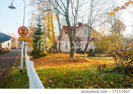KOUVOLA, FINLAND - OCTOBER 15, 2018: Beautiful autumn in old rustic museum district of Kouvola - Kaunisnurmi KOUVOLA, FINLAND - OCTOBER 15, 2018: Beautiful autumn in old rustic museum district of Kouvola - Kaunisnurmi 77157667