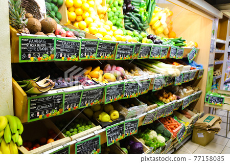 Organic vegetables and fruits in a French supermarket Organic vegetables and fruits in a French supermarket 77158085
