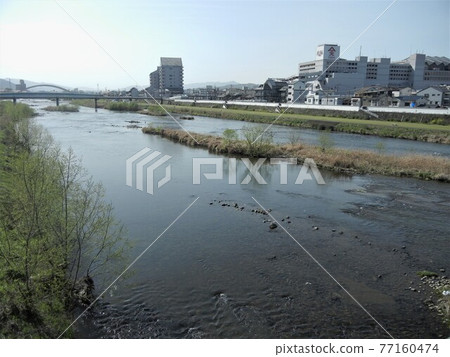 River scenery in Japan: Yoshii River flowing through Tsuyama City, Okayama Prefecture 77160474