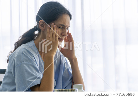Chronic dizzy unhealthy or insurance concept. Patient young woman holding hand on own head Chronic dizzy unhealthy or insurance concept. Patient young woman holding hand on own head 77160696