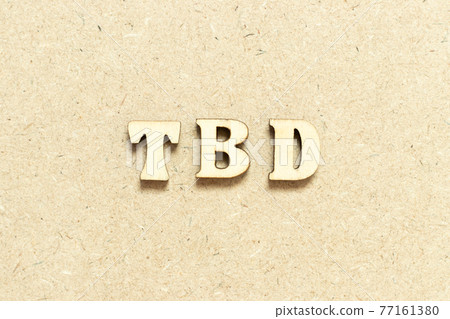 Alphabet letter in word TBD (Abbreviation of to be defined, discussed, determined, decided, deleted or declared) on wood background 77161380