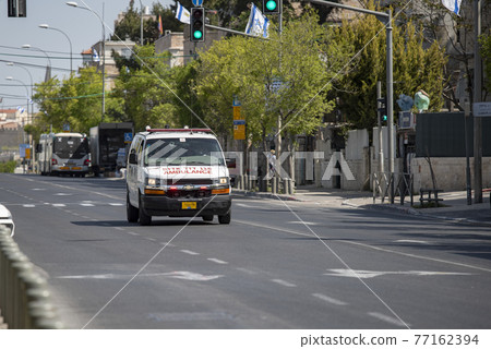 Jerusalem Israel April 2021 View of a ambulance in the street of Jerusalem in Israel on afternoon 77162394