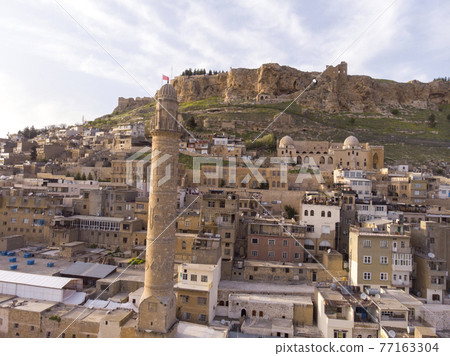 Mardin City in Turkey. Mardin old town. Mardin is a historical city in Southeastern Anatolia, Turkey. Mardin, the shining city of Mesopotamia Mardin City in Turkey. Mardin old town. Mardin is a historical city in Southeastern Anatolia, Turkey. Mardin, the shining city of Mesopotamia 77163304