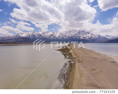 Thin Sandy Spit Coastline in Van Golu lake. Van is the largest lake in Turkey Thin Sandy Spit Coastline in Van Golu lake. Van is the largest lake in Turkey 77163320