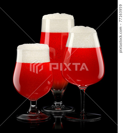 Set of fresh light beer glasses with bubble froth isolated on black background. 77163959