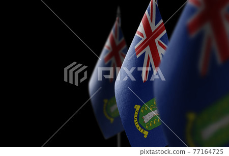 Small national flags of the British Virgin Islands on a black background 77164725