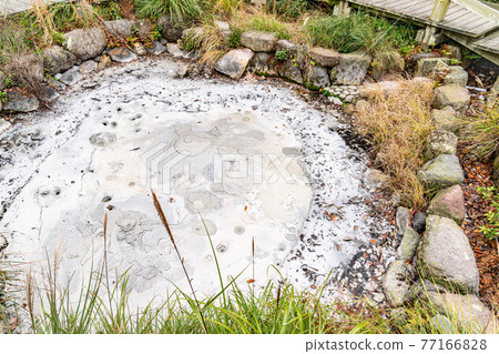 A photo of a mud volcano at the tourist attraction "Unzen Hell" in Nagasaki Prefecture in Japan 77166828