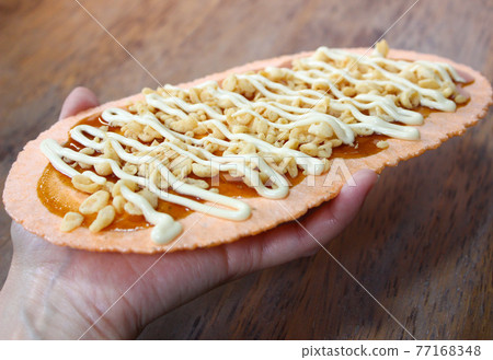 "Takosen" held in hand "Takosen" held in hand 77168348