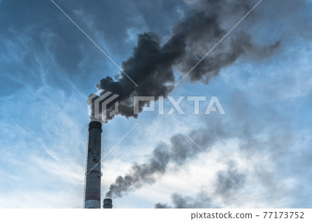 Smoking factory chimneys.Environmental problem of pollution of environment and air in large cities.Climate change,ecology and global warming.The sky is smoky with toxic substances.Soot from factories Smoking factory chimneys.Environmental problem of pollution of environment and air in large cities.Climate change,ecology and global warming.The sky is smoky with toxic substances.Soot from factories 77173752