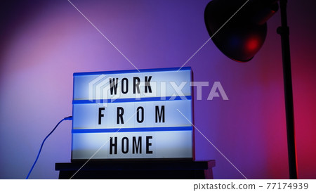 Work from home light box in studio. WFH Text on lightbox. Represent work from home for social distancing concept during coronavirus pandemic. WFH message on light board COVID 19 quarantine situation. Work from home light box in studio. WFH Text on lightbox. Represent work from home for social distancing concept during coronavirus pandemic. WFH message on light board COVID 19 quarantine situation. 77174939