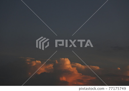 Clouds dyed in vermilion due to the sunrise Clouds dyed in vermilion due to the sunrise 77175749