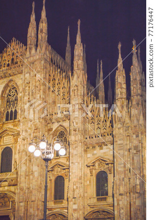 Milan, Italy-October 05, 2018: close view of Milan Cathedral Cattedrale di Santa Maria Nascente, evening, vertical frame 77176447
