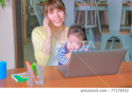 Infant being kidnapped by a mother talking on the phone while remembering Infant being kidnapped by a mother talking on the phone while remembering 77176832
