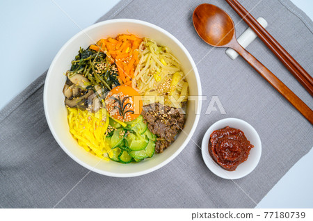 Meatballs with vegetables on a black background Meatballs with vegetables on a black background 77180739