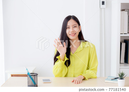 Young asian business woman video call with camera for conference online for interview at home. Young asian business woman video call with camera for conference online for interview at home. 77181540
