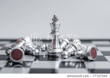 Chess king figure stand out from crowd of enermy or opponent during chessboard competition. Strategy, Success, management, business planning, disruption, win and leadership concept 77187884