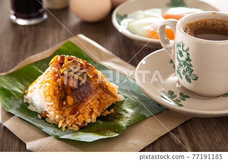 Oriental breakfast set in Malaysia consisting of coffee, nasi lemak, toast bread and half-boiled egg Oriental breakfast set in Malaysia consisting of coffee, nasi lemak, toast bread and half-boiled egg 77191185