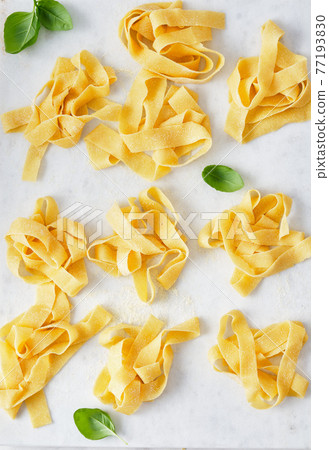 Homemade Pasta. Seen from above. Close-up. Homemade food. Homemade Pasta. Seen from above. Close-up. Homemade food. 77193830