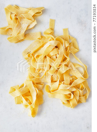Homemade Pasta. Seen from above. Close-up. Homemade food. Homemade Pasta. Seen from above. Close-up. Homemade food. 77193834