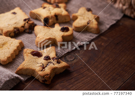 Healthy homemade cookies on wooden background Healthy homemade cookies on wooden background 77197340