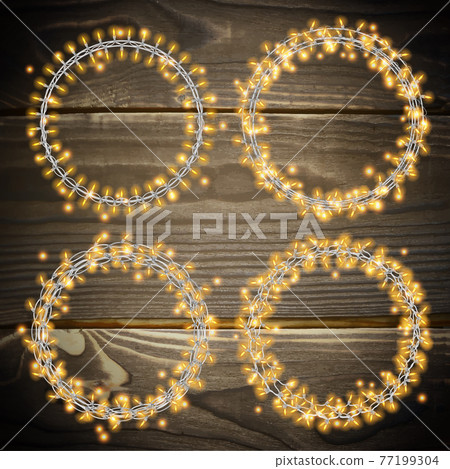 Set of garland lights. Glowing round christmas lights on wooden background. Includes vector brushes festive strands of Christmas lights Set of garland lights. Glowing round christmas lights on wooden background. Includes vector brushes festive strands of Christmas lights 77199304
