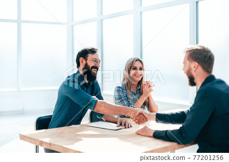 business people shaking hands during the interview. 77201256