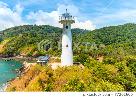 Lighthouse on green coast Lighthouse on green coast 77201600