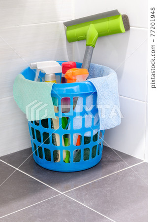 Group of the cleaning set in the plastic basket. 77201948