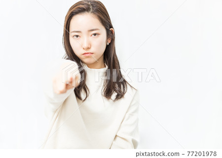 A woman pointing to the front 77201978