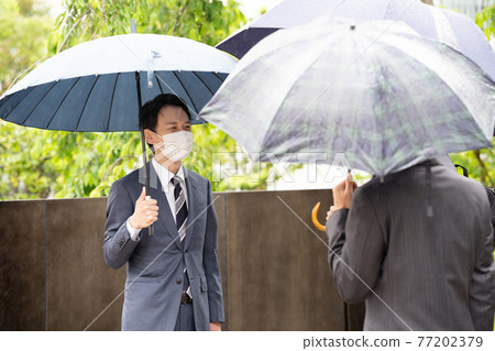 Businessman rain umbrella rainy season Businessman rain umbrella rainy season 77202379