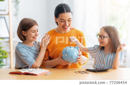 women calculating family budget 77206454