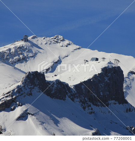 Summit stations of cable cars. Suspension bridge connecting two peaks of Mount Sex Rouge. 77208001