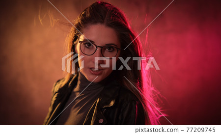 Young energetic woman - colorful portrait shot Young energetic woman - colorful portrait shot 77209745