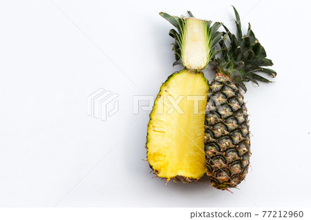 Fresh pineapple on white background. Copy space Fresh pineapple on white background. Copy space 77212960