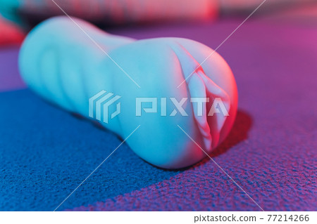 Close-up of male sex toy, realistic vagina masturbator. 77214266