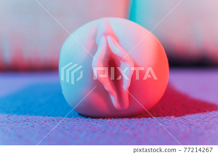 Close-up of male sex toy, realistic vagina masturbator. 77214267