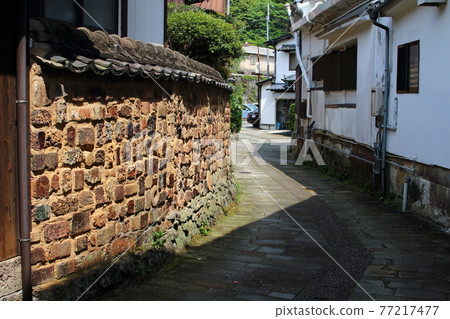 Back street with Tombai fence 77217477