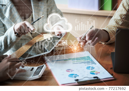 Group of Businessman and Accountant checking data document on digital tablet for investigation of corruption account . Anti Bribery concept. Group of Businessman and Accountant checking data document on digital tablet for investigation of corruption account . Anti Bribery concept. 77217692
