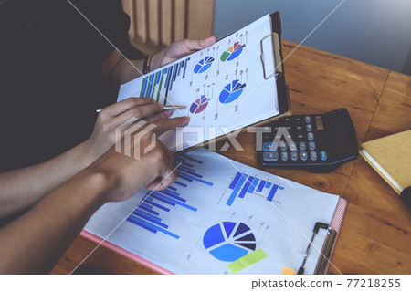 Group of Businesswoman and Accountant checking data document on digital tablet for investigation of corruption account . Anti Bribery concept. 77218255